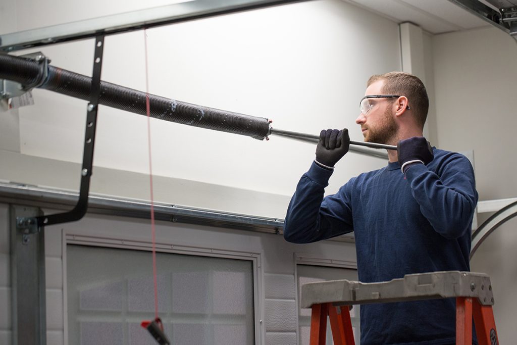 3 Garage Door Torsion Spring Replacement Problems & Tips for Troubleshooting