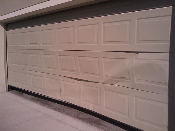 What Should I Do If My Garage Door Gets Dented?