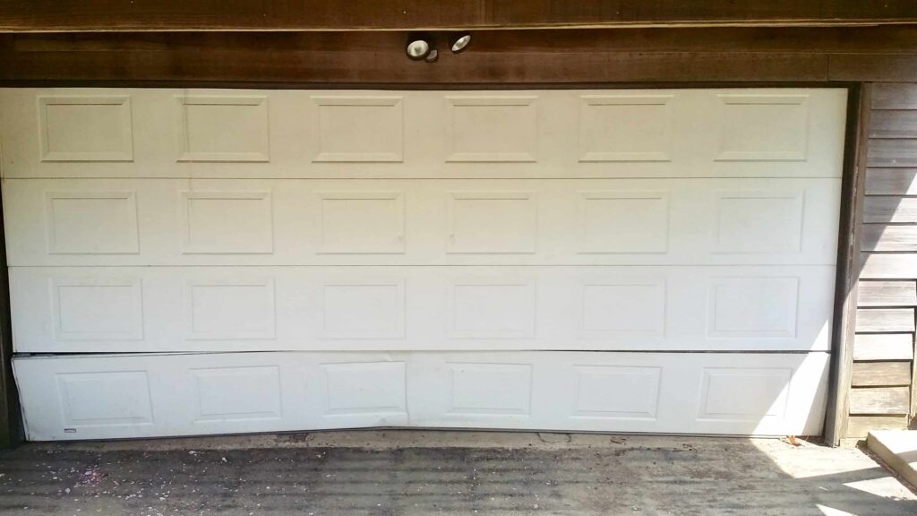 Should You Replace a Single Garage Door Panel or the Entire Garage Door?